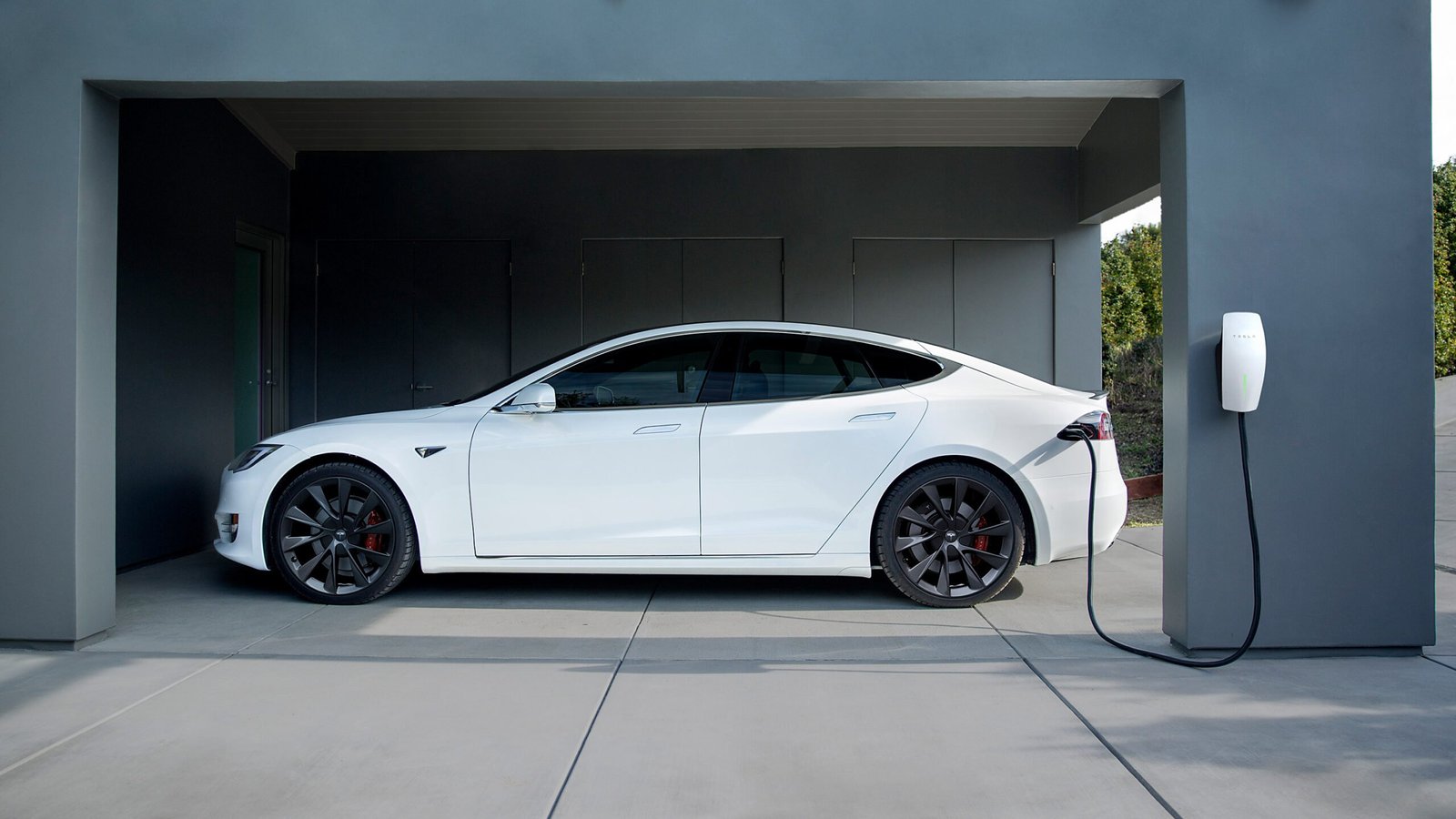 Tesla electric car chrging at Tesla charging station Gen 3 Wall connector